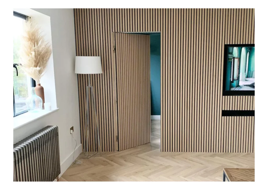 Generate an image of a hidden closet door that blends seamlessly with the surrounding wall. Hidden or Camouflaged Doors